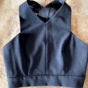 Cross Back crop top-with cut out in back. Zipper up the side and lined